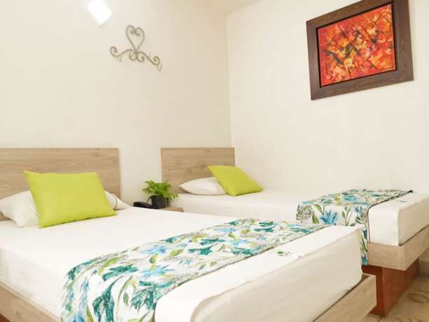 Imagen de la habitación del Hotel Macedonia Plaza Medellin. Foto 5