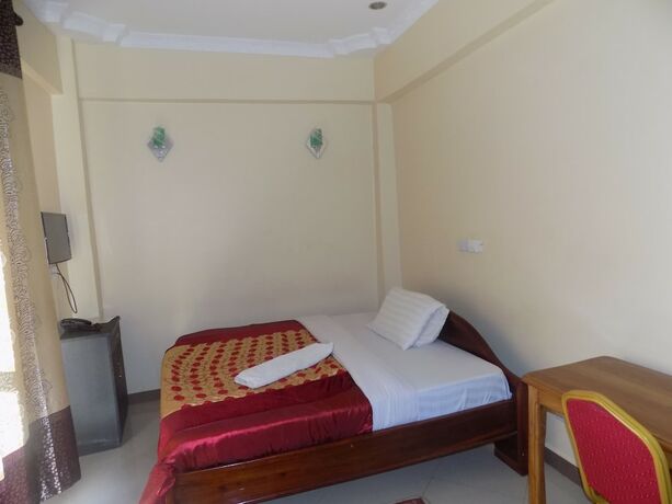 Imagen de la habitación del Hotel Machare British. Foto 11