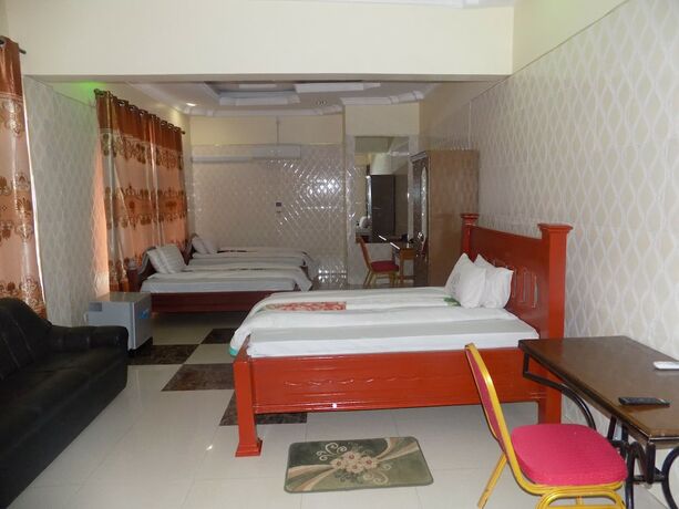 Imagen de la habitación del Hotel Machare British. Foto 17