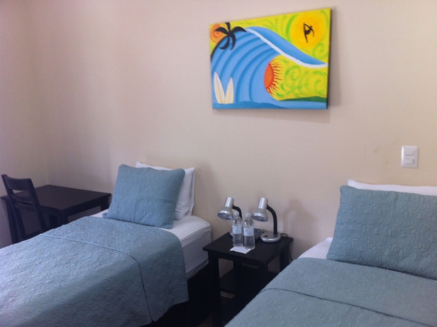 Imagen de la habitación del Hotel Machele' S Place Beachside and Pool. Foto 4