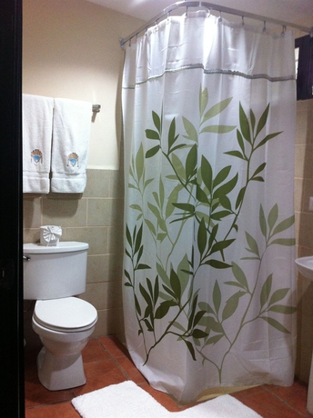 Imagen de la habitación del Hotel Machele' S Place Beachside and Pool. Foto 6