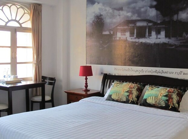 Imagen de la habitación del Hotel Machima House. Foto 18