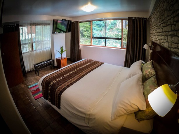 Imagen de la habitación del Hotel Machu Picchu Adventure House. Foto 8