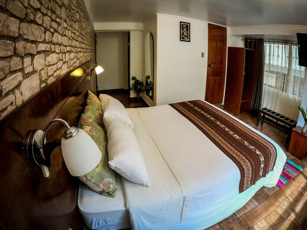 Imagen de la habitación del Hotel Machu Picchu Adventure House. Foto 12