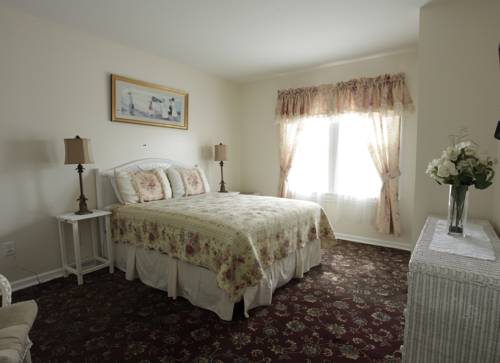 Imagen de la habitación del Hotel Macomber. Foto 10