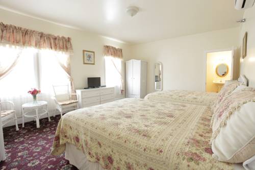 Imagen de la habitación del Hotel Macomber. Foto 11