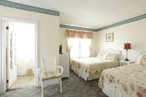 Imagen de la habitación del Hotel Macomber. Foto 13
