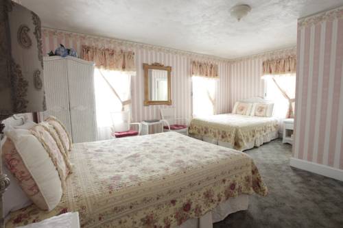 Imagen de la habitación del Hotel Macomber. Foto 14