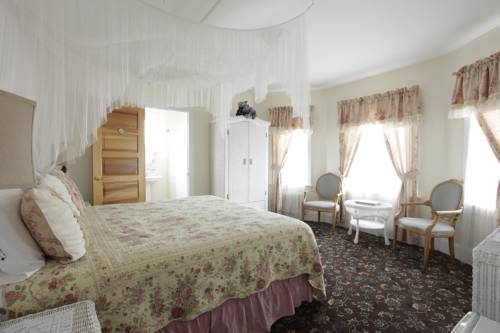 Imagen de la habitación del Hotel Macomber. Foto 16