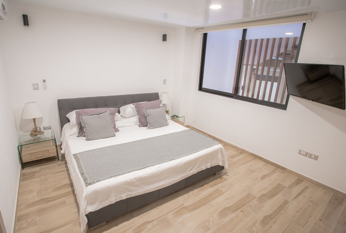 Imagen de la habitación del Hotel Macondo 5th Av Condos. Foto 2
