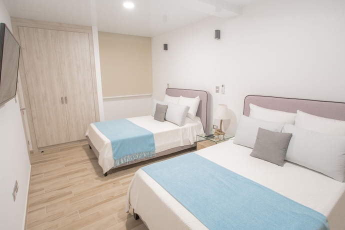 Imagen de la habitación del Hotel Macondo 5th Av Condos. Foto 3