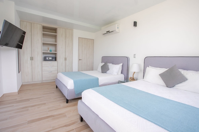 Imagen de la habitación del Hotel Macondo 5th Av Condos. Foto 4