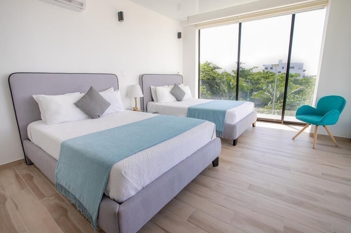 Imagen de la habitación del Hotel Macondo 5th Av Condos. Foto 5