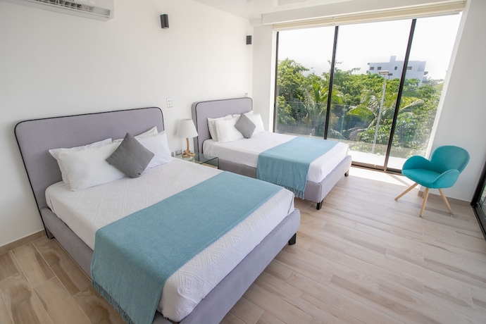 Imagen de la habitación del Hotel Macondo 5th Av Condos. Foto 6