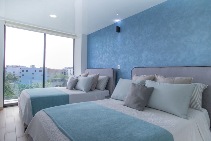 Imagen de la habitación del Hotel Macondo 5th Av Condos. Foto 9
