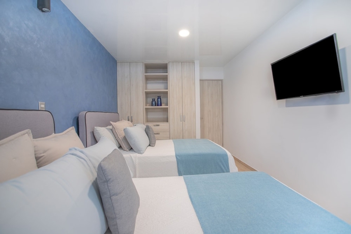 Imagen de la habitación del Hotel Macondo 5th Av Condos. Foto 10