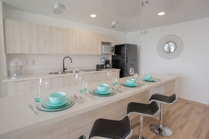Imagen de la habitación del Hotel Macondo 5th Av Condos. Foto 11