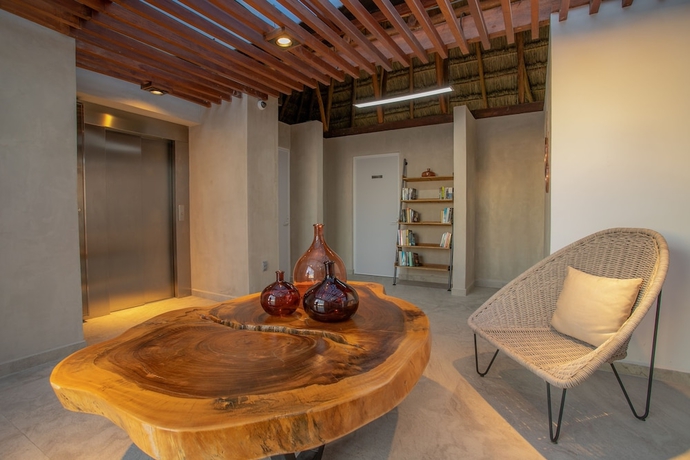 Imagen de los interiores del Hotel Macondo 5th Av Condos. Foto 18