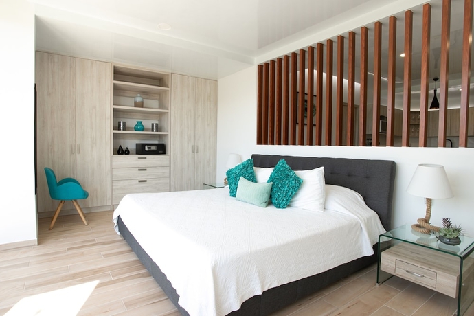 Imagen de la habitación del Hotel Macondo 5th Av Condos. Foto 12