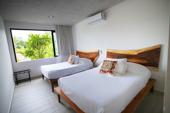 Imagen de la habitación del Hotel Macondo Tulum. Foto 16