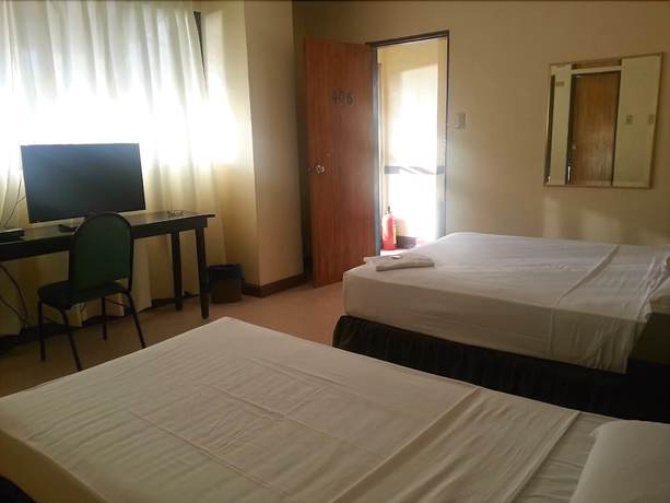 Imagen de la habitación del Hotel Mactan Pension House. Foto 7