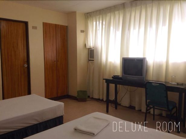 Imagen de la habitación del Hotel Mactan Pension House. Foto 13