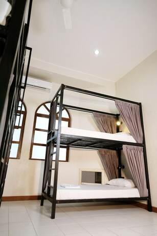 Imagen de la habitación del Hotel Mad Monkey Dumaguete. Foto 21