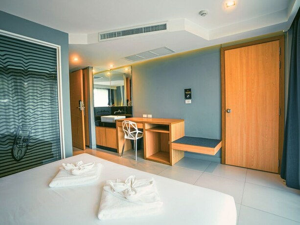 Imagen de la habitación del Hotel Mad Monkey Phuket. Foto 19