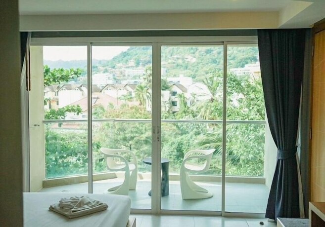 Imagen de la habitación del Hotel Mad Monkey Phuket. Foto 34