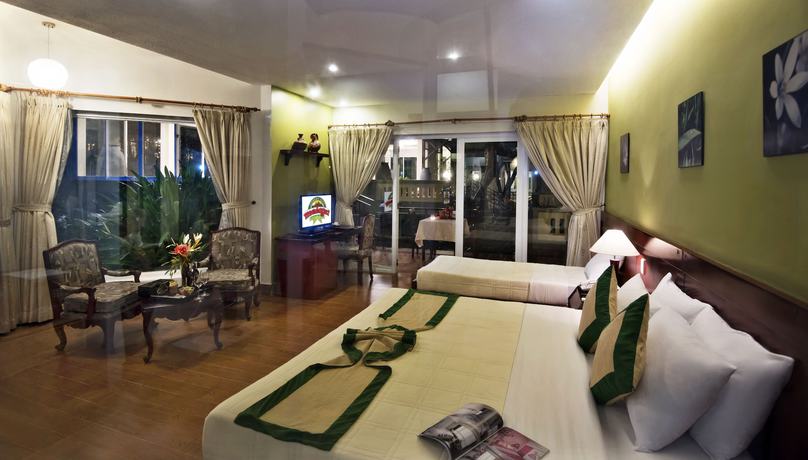 Imagen de la habitación del Hotel Madagui Forest City. Foto 2