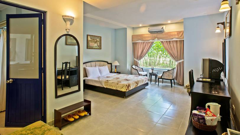 Imagen de la habitación del Hotel Madagui Forest City. Foto 4