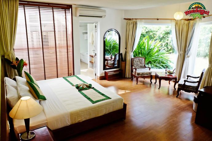 Imagen de la habitación del Hotel Madagui Forest City. Foto 5