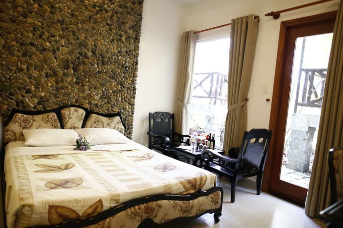 Imagen de la habitación del Hotel Madagui Forest City. Foto 7