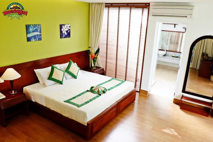 Imagen de la habitación del Hotel Madagui Forest City. Foto 15