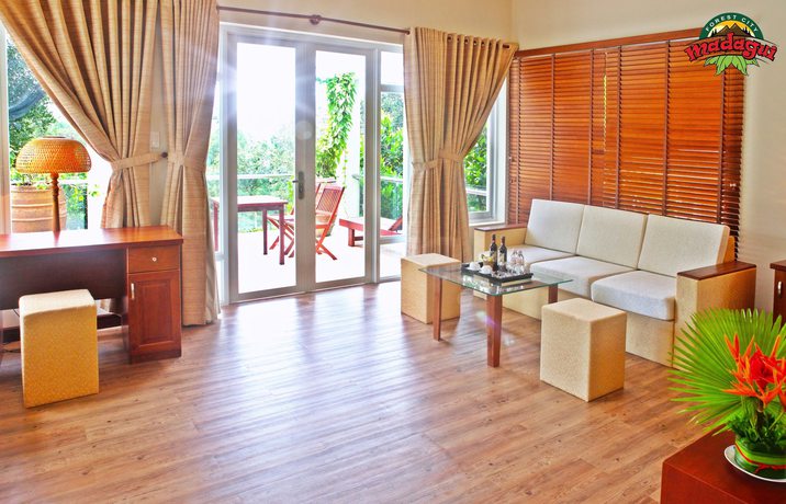 Imagen de la habitación del Hotel Madagui Forest City. Foto 16