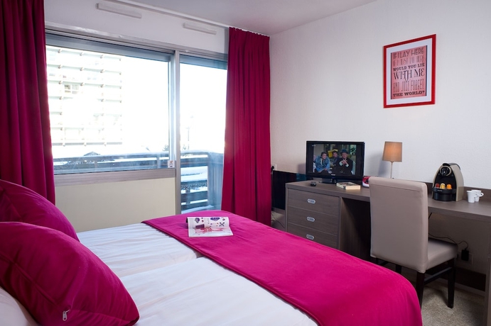 Imagen de la habitación del Hotel Madame Vacances Courchevel Olympic. Foto 5