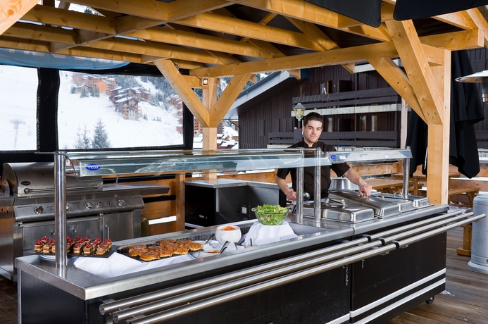 Imagen del bar/restaurante del Hotel Madame Vacances Le Mottaret. Foto 2