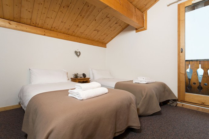 Imagen de la habitación del Hotel Madame Vacances Les Chalets des Alpages. Foto 9