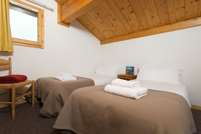 Imagen de la habitación del Hotel Madame Vacances Les Chalets des Alpages. Foto 14