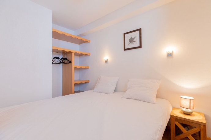 Imagen de la habitación del Hotel Madame Vacances Residence Le Parc Des Airelles. Foto 5
