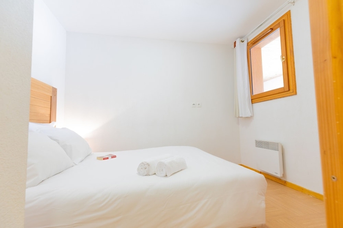 Imagen de la habitación del Hotel Madame Vacances Residence Le Parc Des Airelles. Foto 9
