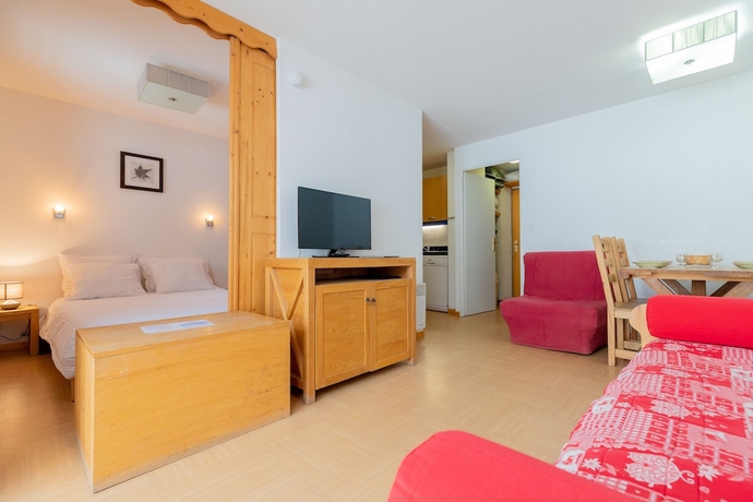 Imagen de la habitación del Hotel Madame Vacances Residence Le Parc Des Airelles. Foto 11