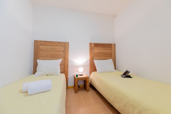 Imagen de la habitación del Hotel Madame Vacances Residence Le Parc Des Airelles. Foto 12
