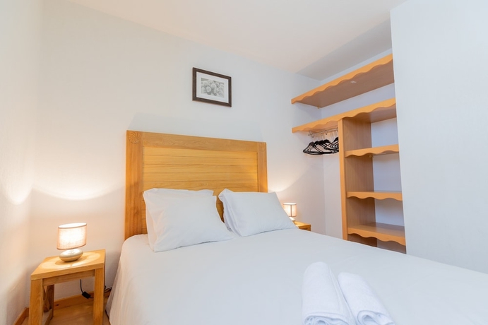 Imagen de la habitación del Hotel Madame Vacances Residence Le Parc Des Airelles. Foto 14