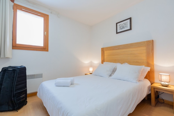Imagen de la habitación del Hotel Madame Vacances Residence Le Parc Des Airelles. Foto 15