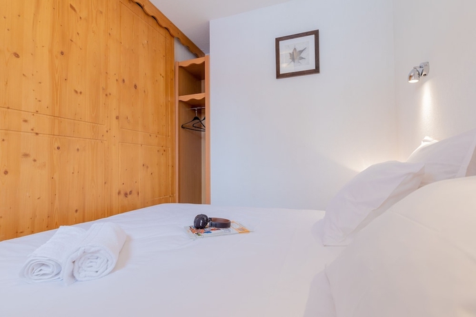 Imagen de la habitación del Hotel Madame Vacances Residence Le Parc Des Airelles. Foto 16