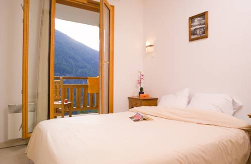 Imagen de la habitación del Hotel Madame Vacances Residence Les Balcons Des Airelles. Foto 11