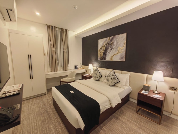 Imagen de la habitación del Hotel Madayaw Tagum. Foto 2