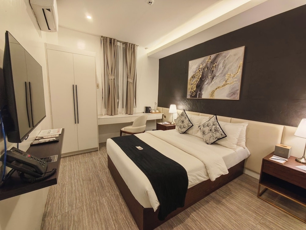Imagen de la habitación del Hotel Madayaw Tagum. Foto 3