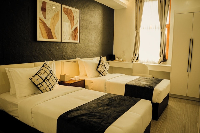 Imagen de la habitación del Hotel Madayaw Tagum. Foto 4